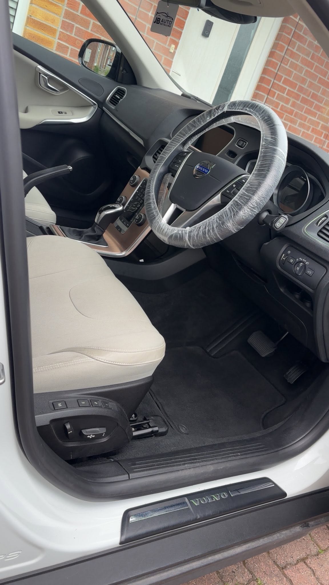 Volvo interior with seat and steering wheel covers fitted